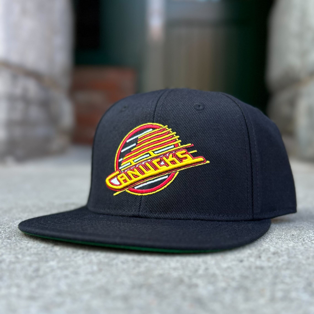 Canucks skate logo hat sales